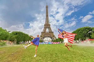 International Prints: Patriotic American Woman jumping and cheering for Team USA
