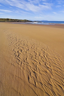 Patterns in the sand at Redpoint sandy beach