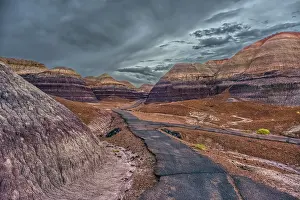 Paved Prints: Paved trail below Blue Mesa on a rainy day in Petrified Forest National Park in Arizona