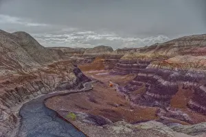 Paved Prints: Paved trail leads through Blue Mesa area in Petrified Forest National Park in Arizona with scenic views of