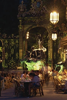 Pavement cafe at night in the Place Stanislas in Nancy, UNESCO World Heritage Site