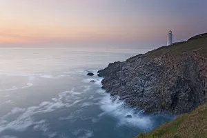 A peaceful dusk on Cornwalls Atlantic coast, showing the lighthouse at Trevose Head