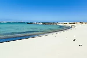 Images Dated 10th August 2010: Peaceful northern sandy beach on the road to Corralejo near this quiet village, El Cotillo
