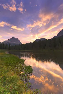 Antorno Lake Prints: Three Peaks of Lavaredo are reflected in the Antorno Lake during sunrise. Sesto Dolomites