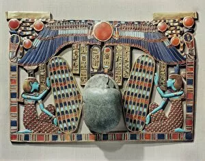 Images Dated 27th July 2008: Pectoral decorated with winged scarab, protected by the goddesses Isis and Nephthys