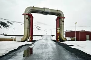 Geothermal Gallery: Peculiar pipework built over the road, Krafla Power Station, is the largest Geothermal