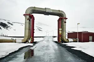 Fuel And Power Generation Prints: Peculiar pipework built over the road, Krafla Power Station, is the largest Geothermal