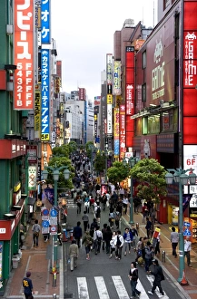 Images Dated 17th May 2009: A pedestrian street lined with shops and signboards attracts a crowd in Shinjuku