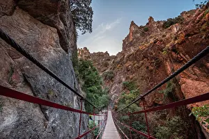 Pedestrian suspension bridge leading through the gorge of Los Cahorros Monachil, Monachil, Sierra Nevada, Granada, Andalusia, Spain, Europe