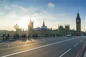Houses Of Parliament Collection: Pedestrians on Westminster Bridge with Houses of Parliament and Big Ben at sunset