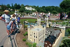Berkshire Collection: People admiring models of the Tower of London and Tower Bridge, Legoland amusement park