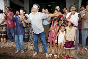 New Year Prints: People at the annual Pimai water festival or the Lao