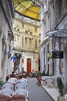 Arcade Prints: People at cafes in Macca-Villacrosse Passage, Bucharest, Romania, Europe