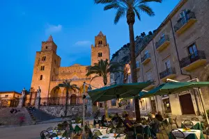 Piazza Duomo Prints: People dining in Piazza Duomo in front of the Norman Cathedral of Cefalu illuminated at night