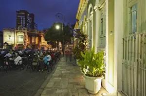 Stereotypically Brazilian Prints: People eating at outdoor restaurants in Praca Sao Sebastiao (St)