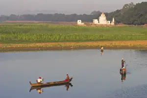People fishing on Taugthaman Lake near Spiral temple and U Beins Bridge