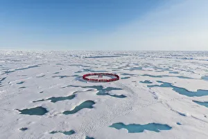 North Pole Prints: People forming a circle to memorise to have arrived on the North Pole, Arctic