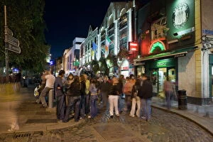 People gathered in Temple Bar, Dublin, Republic of Ireland, Europe