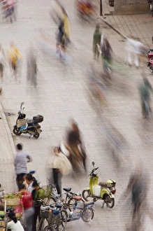 Scooter Prints: People in the historic old town of Pingyao City, Shanxi Province, China, Asia