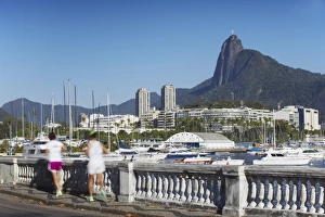 Fitness Prints: People jogging with Christ the Redeemer statue in background