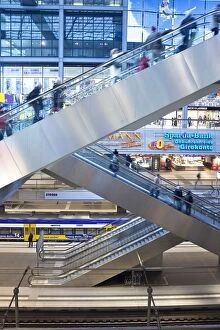 Images Dated 16th December 2009: People moving up escalator at new modern main railway station, Berlin, Germany, Europe