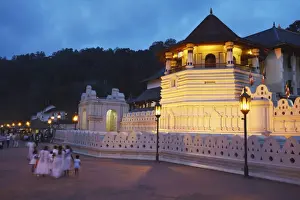 Kandy Prints: People outside Temple of the Tooth (Sri Dalada Maligawa) at dusk