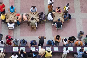Parque Cespedes Prints: People playing chess and dominoes at a school festival in Parque Cespedes