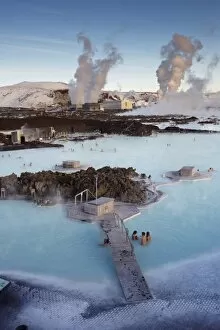 Images Dated 4th October 2008: People relaxing in Blue Lagoon geothermal spa, Svartsengi Geothermal Power Station in the distance