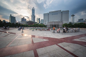 Shanghai Prints: People relaxing and playing at Peoples Square after work, Shanghai, China, Asia