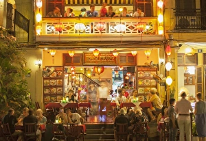 Hoi An Prints: People at restaurant on An Hoi island