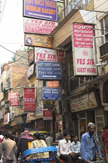 Rick Shaw Prints: People riding rickshaws and street signs