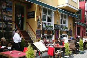 Images Dated 30th April 2008: People sitting at an outdoor cafe in the Ortakoy Quarter, Istanbul, Turkey, Europe