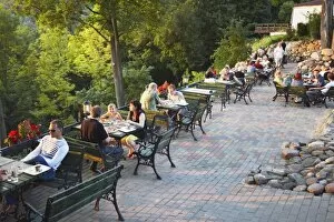 People sitting on patio at Tores Restaurant, Uzupis District, Vilnius, Uzupis District