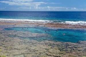 South Pacific Gallery: People swimming in the amazing Limu low tide pools, Niue, South Pacific, Pacific