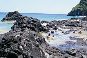 Pernambuco Prints: People swimming at Baia dos Porcos inside natural swimming pools