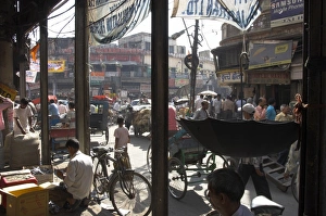 Delhi Prints: People and vehicles in the spice market