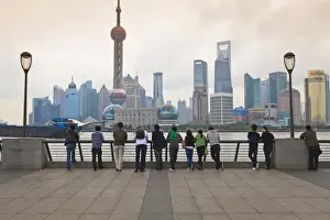 Pu Dong Prints: People viewing the Pudong skyline and the Oriental Pearl Tower from the Bund