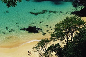 Pernambuco Prints: People walking on Baia do Sancho beach, Parque Nacional de Fernando de Noronha