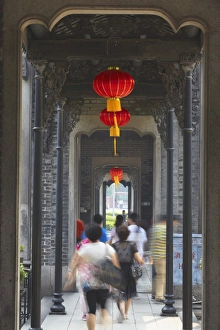 Corridor Prints: People walking along corridor at Chen Clan Academy, Guangzhou, Guangdong, China, Asia