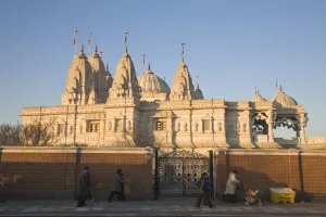 Authority Prints: People walking past Shri Swaminarayan Mandir Temple