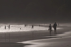 Images Dated 15th April 2009: People walking along the wonderful Elephanta Beach in the dusk, Havelock Island