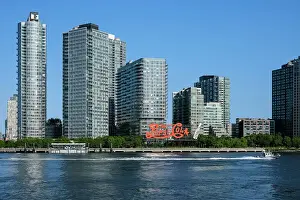 The Pepsi-Cola sign, built in 1940, a neon sign at Gantry Plaza State Park in the Long Island City neighborhood of Queens, visible fromManhattan the East East River, New York City, United States of America, North America