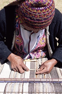 Cloth Prints: A Peruvian man weaving