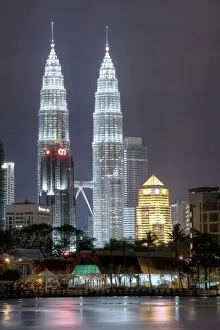 Images Dated 30th December 2011: Petronas Towers dominate the Kuala Lumpur skyline, Titiwangsa in Kuala Lumpur, Malaysia