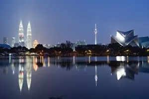 Images Dated 7th September 2009: Petronas Towers and Istana Budaya National Theatre, Lake Titiwangsa, Kuala Lumpur