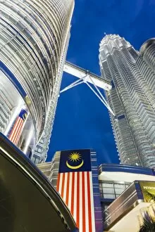 Images Dated 9th July 2008: Petronas Towers and Malaysian national flag, Kuala Lumpur, Malaysia, Southeast Asia, Asia