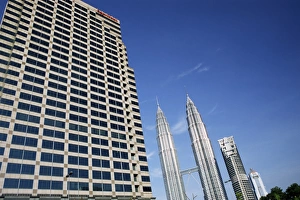 Petronas Prints: Petronas twin towers and business building on left