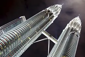 The Petronas Twin Towers, known locally as Menara Berkembar Petronas, are the tallest twin buildings in the world, Kuala Lumpur, Malaysia, Southeast
