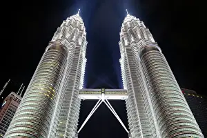 Touristic Prints: Petronas Twin Towers at night, the most famous twin skyscrapers in Kuala Lumpur, Malaysia
