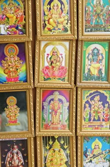Images Dated 9th August 2008: Pictures of various Hindu Gods for sale in Little India